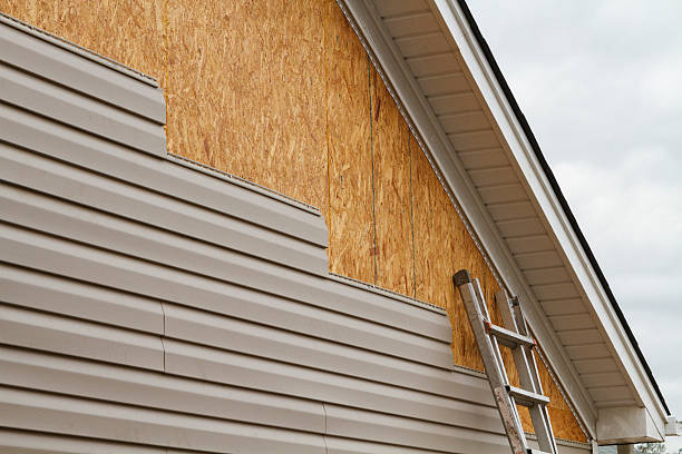 Professional Siding Installation technician working in Roanoke, IN